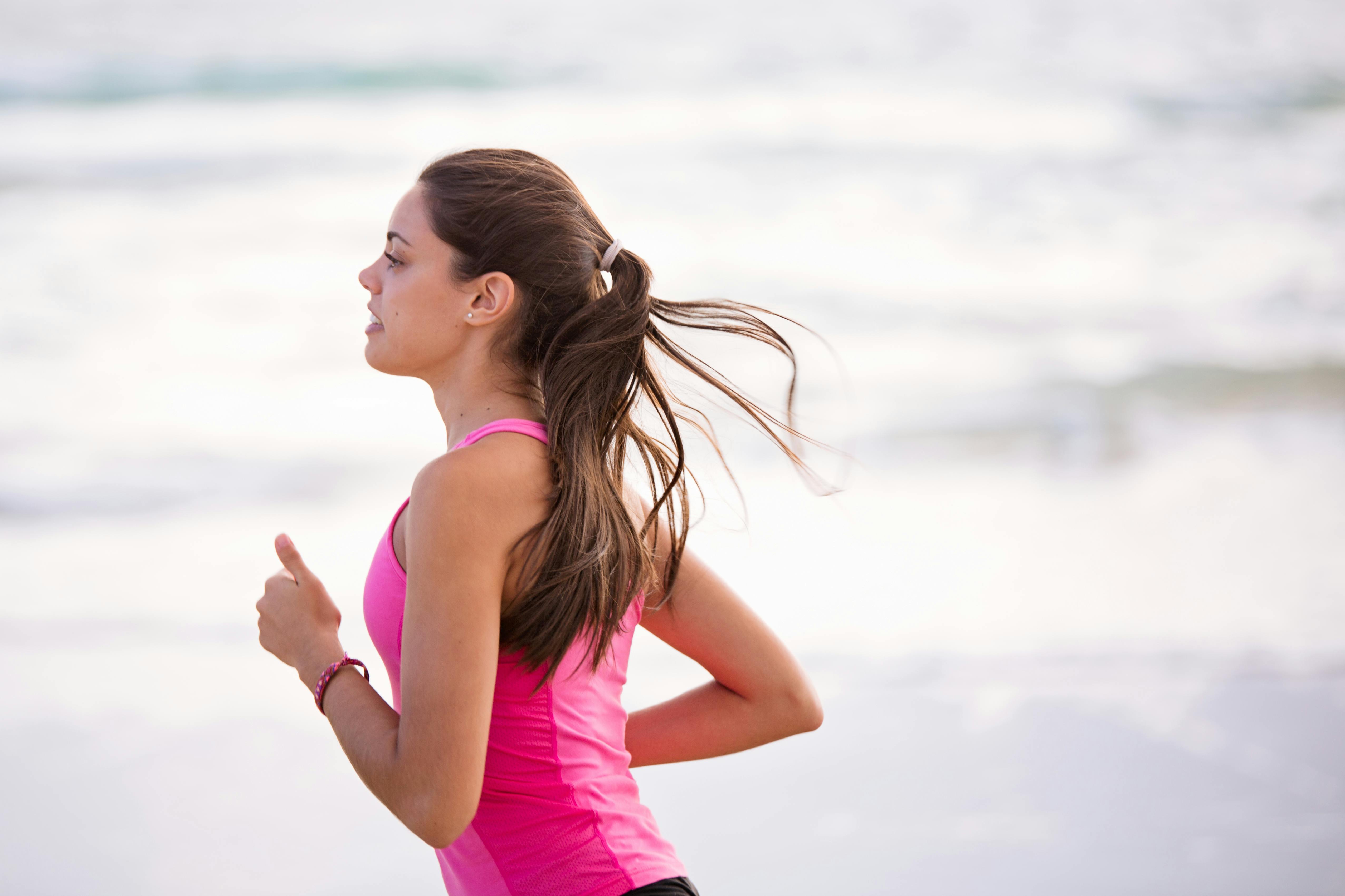 Beginner runner jogging on a path